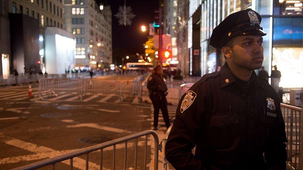 Police officer on a closed Fifth Avenue