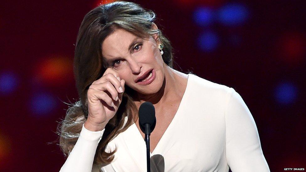 Caitlyn receiving the award on stage