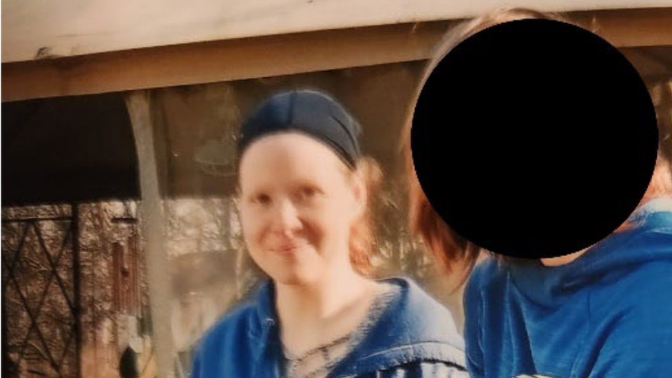 Sarah Clendaniel and an unidentified person pictured in a photo provided by the US justice department