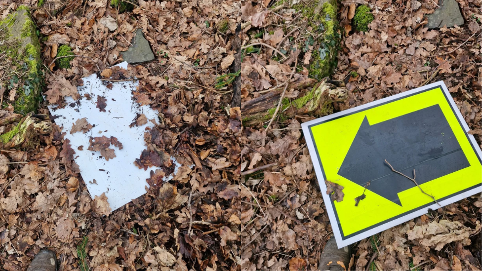 A composite image of a race sign on the ground in Castlemilk Woods. On the left, the white back of the sign is visible underneath a pile of brown leaves. On the right, it is turned the correct way round and has a black arrow on a luminous yellow background.