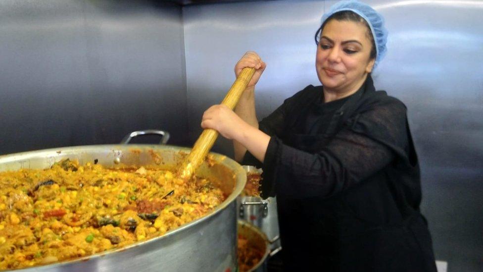 Woman stirring food