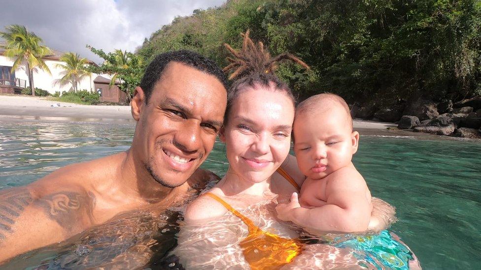 Image of Rhiannon West and her partner and six-month-old baby