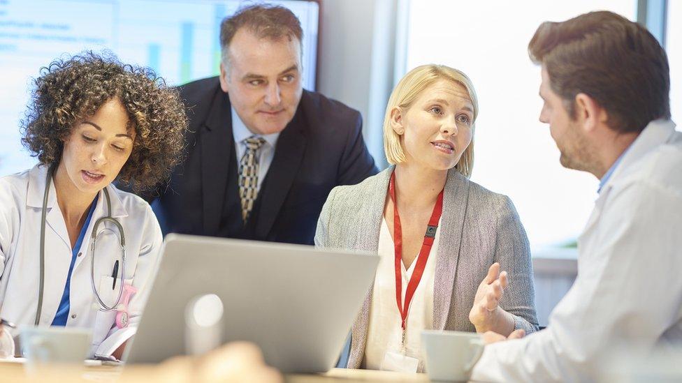 Stock picture of hospital management staff