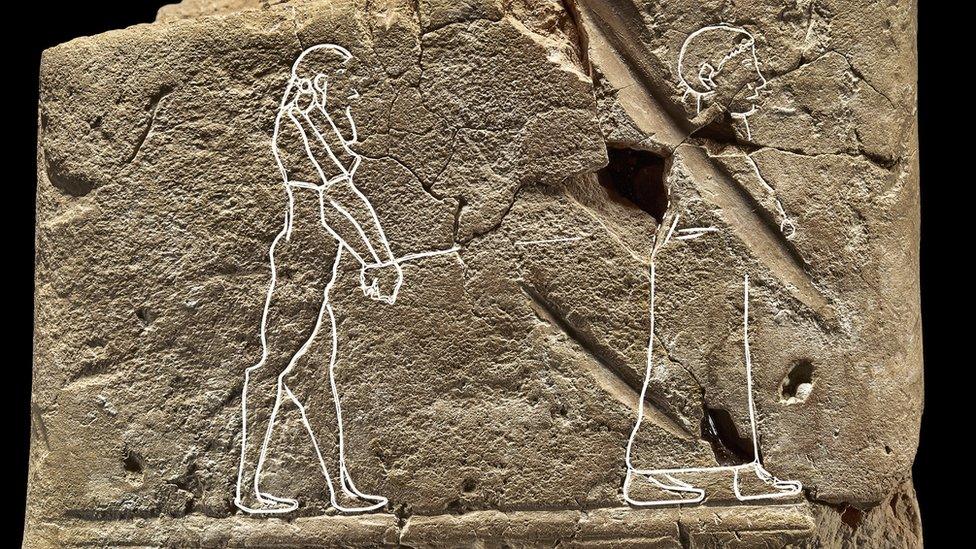 carving-of-ghost-on-tablet