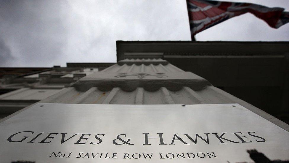 Union Jack flies above Gieves and Hawkes at No 1 Saville Row, London