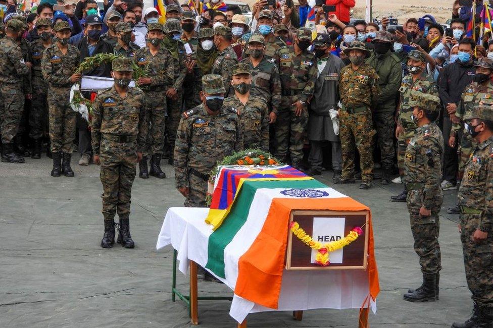 Indian soldiers pay their respects during the funeral of their comrade, Tibetan-origin India's special forces soldier Nyima Tenzin in Leh on September 7, 2020.