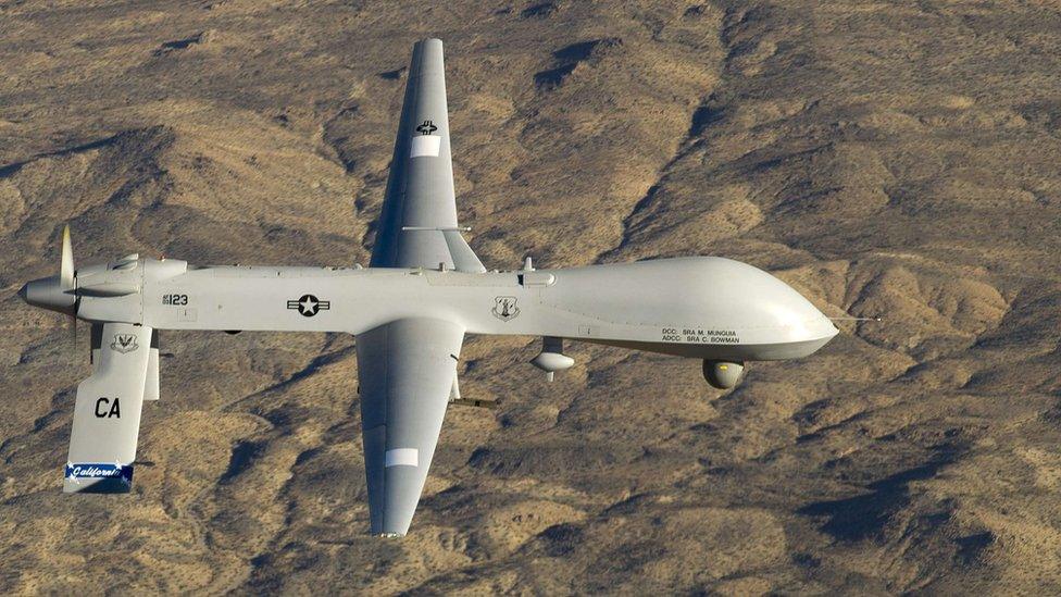 A US Air Force MQ-1 Predator unmanned aerial vehicle flies near the Southern California Logistics Airport in Victorville, California