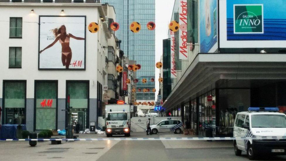 Picture shows police vehicles outside the City 2 shopping centre