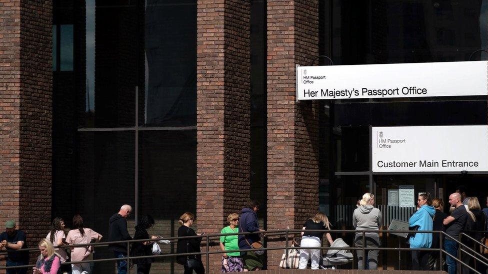 Queue outside passport office in Peterborough taken earlier in May