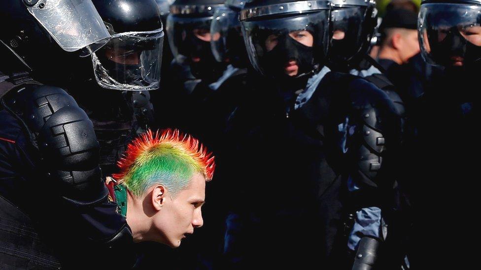 Riot police officers hold a protester in Moscow, Russia on August 03, 2019