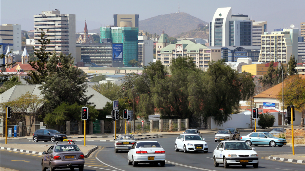 A road in Winhoek with the skyline behind