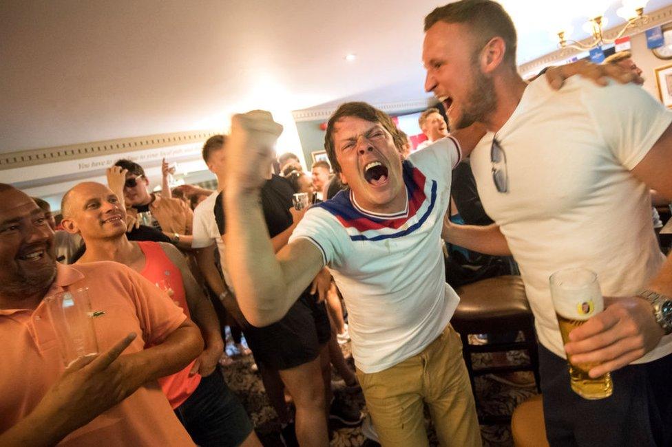 Fans in the The Lord Stamford pub in Manchester