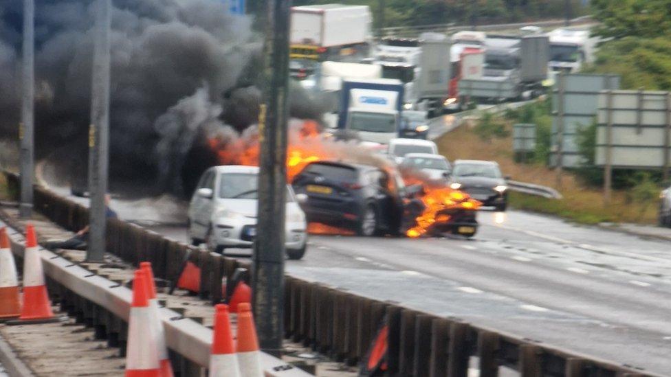 Two cars on fire on the motorway