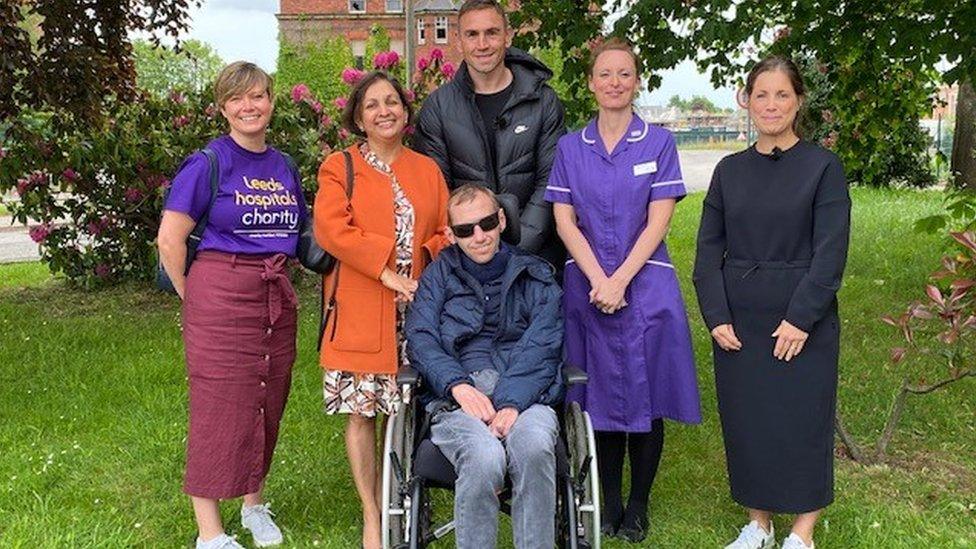 Rob Burrow and his family, together with Kev Sinfield