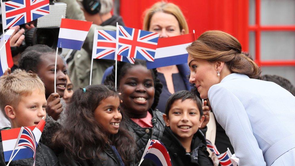 The duchess of Cambridge greets Dutch schoolchildren