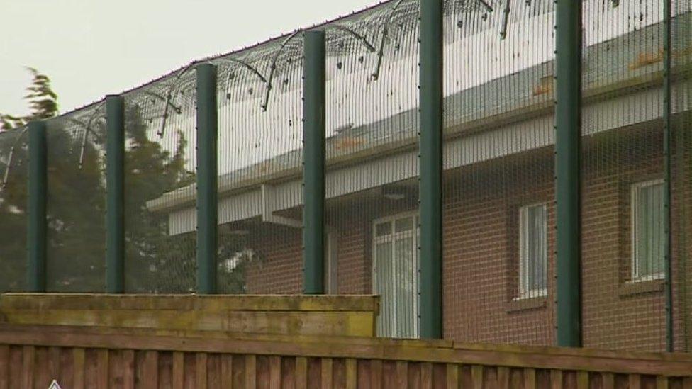 Barbed wire outside the Hassockfield building