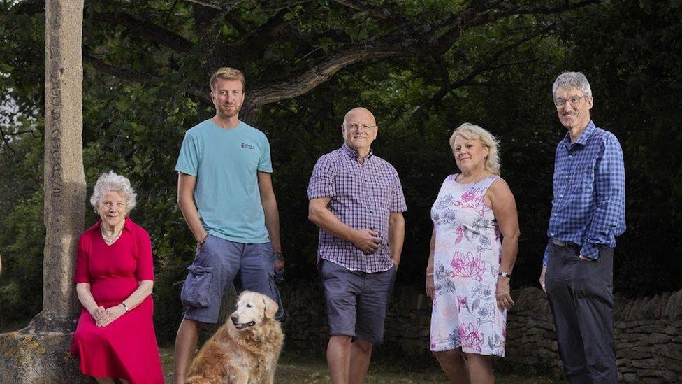 Volunteers at Elmley Castle Village Cross