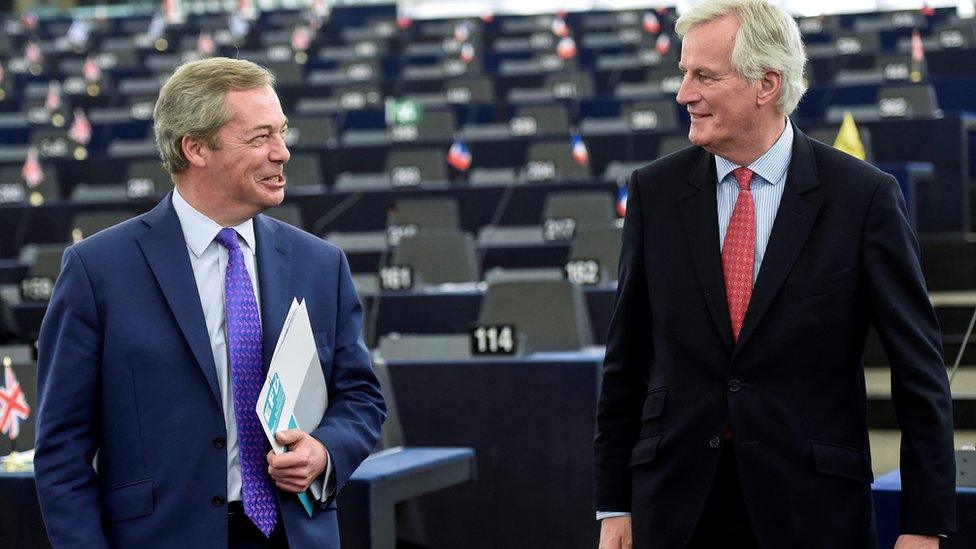 European commission member in charge of Brexit negotiations with Britain, French Michel Barnier (R) speaks with Member of the European Parliament and former leader of the anti-EU UK Independence Party (UKIP) Nigel Farage at the European Parliament in Strasbourg, eastern France, on April 5, 2017