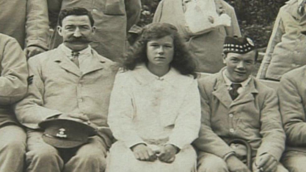 Sgt Joseph Flanagan (left) photographed with other soldiers and a nurse during WW1