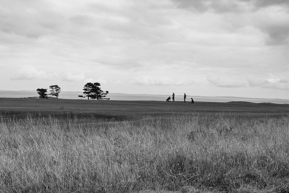 Golfers in black and white