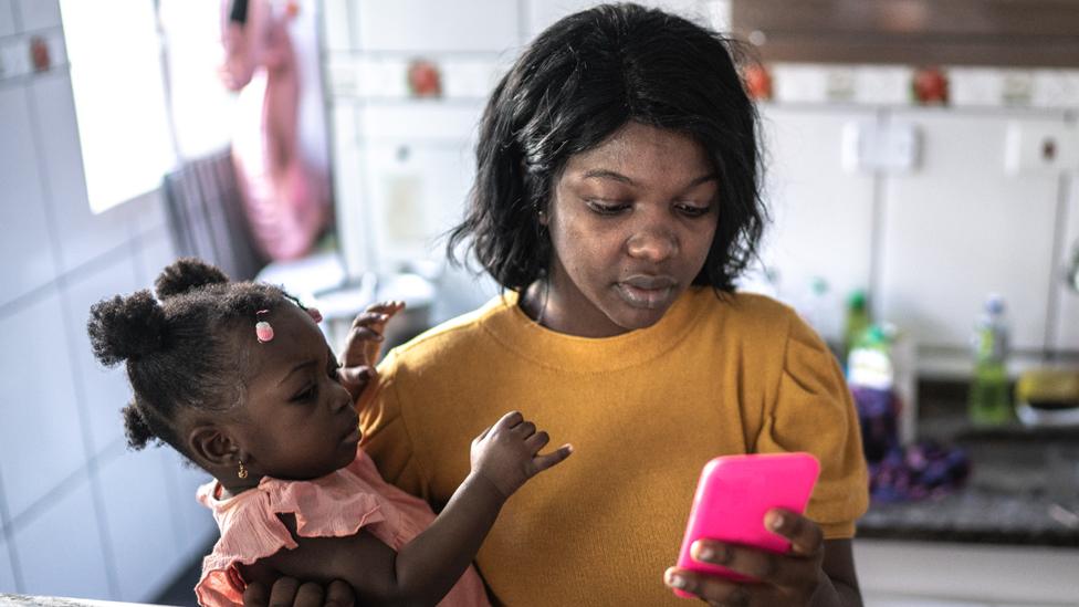 Stock image of a woman with a baby