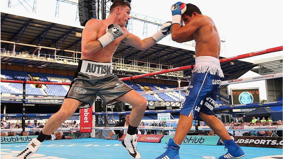 Callum Smith lands a left shot on Cesar Hernan Reynoso