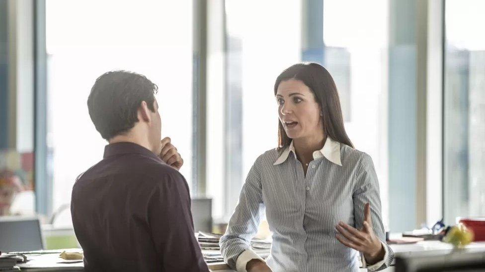 Woman and man in an office