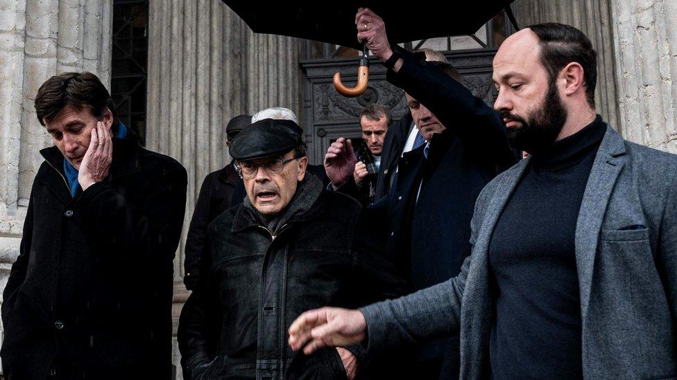 French cardinal Philippe Barbarin (wearing a black cap) leaves Lyon's courthouse after an appeal hearing, 29 November 2019