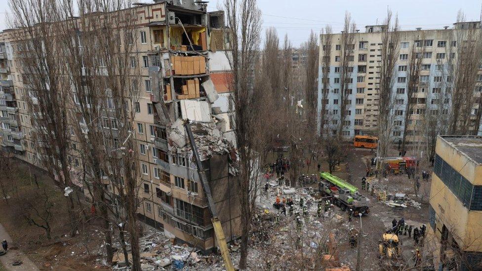 Site of a damaged residential building after an overnight attack in Odesa, 2 March 2024