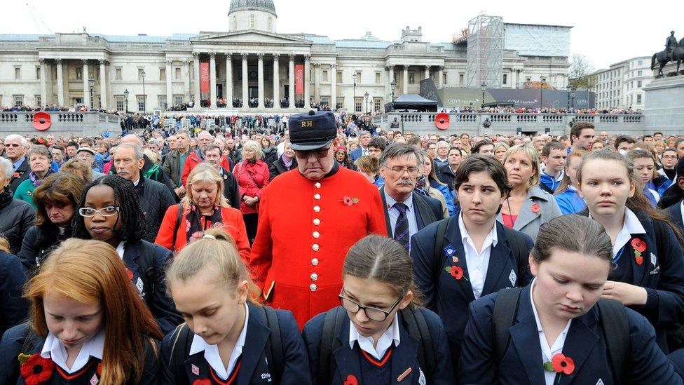 People observing the two minute silence in Trafalgar Square