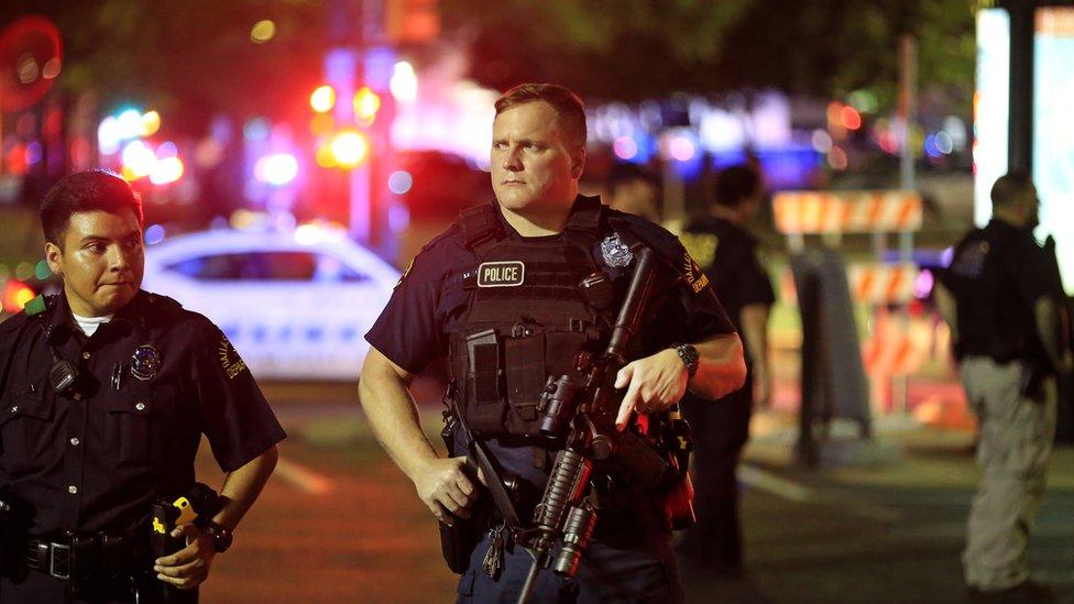 Dallas officers at scene of murder of fellow officers July 7