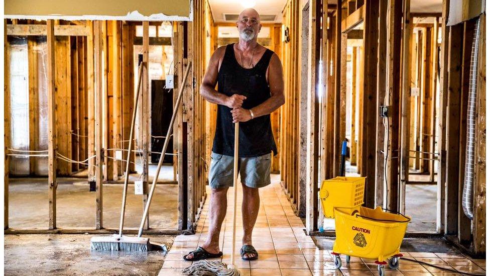 Phillip "Mooney" Brignac, 58, finishes the clean-up of his home in St Amant. He has lived there since 1991, adding to it while raising two children. “We will definitely rebuild. We are St Amant strong. We will do whatever we’ve got to do," he said. St Amant, LA