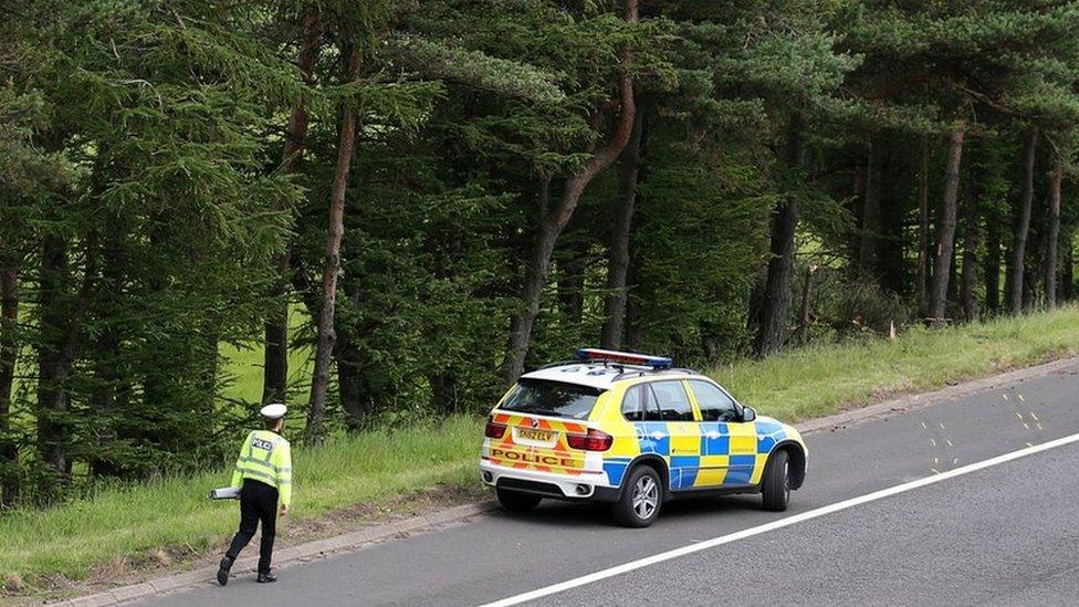 Police at the scene of the crash