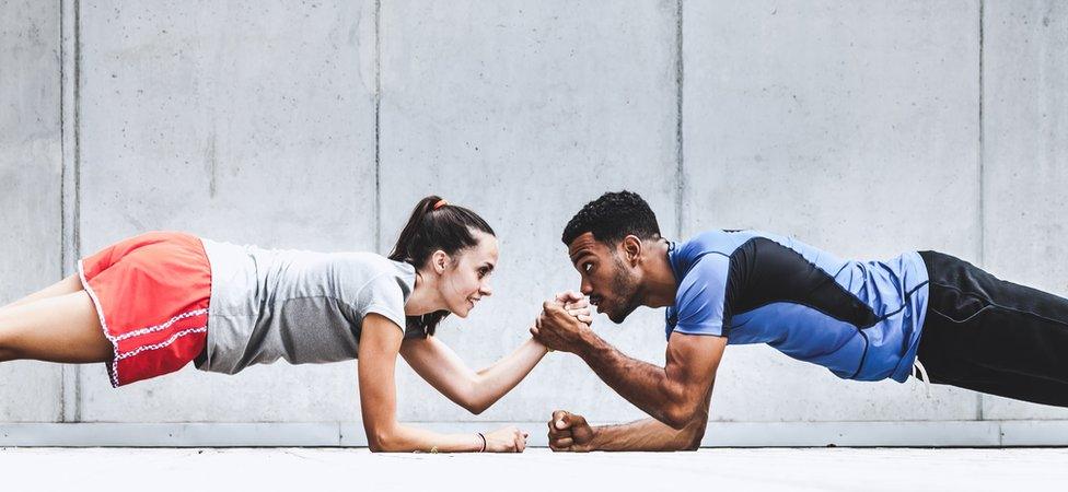 Woman and man exercising