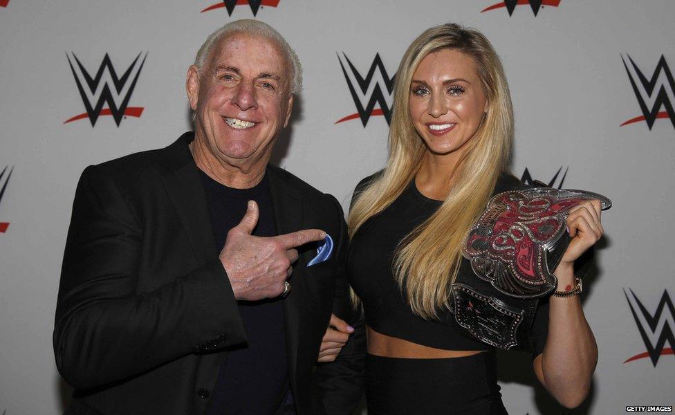 Ric Flair with his daughter Charlotte, also a WWE wrestler