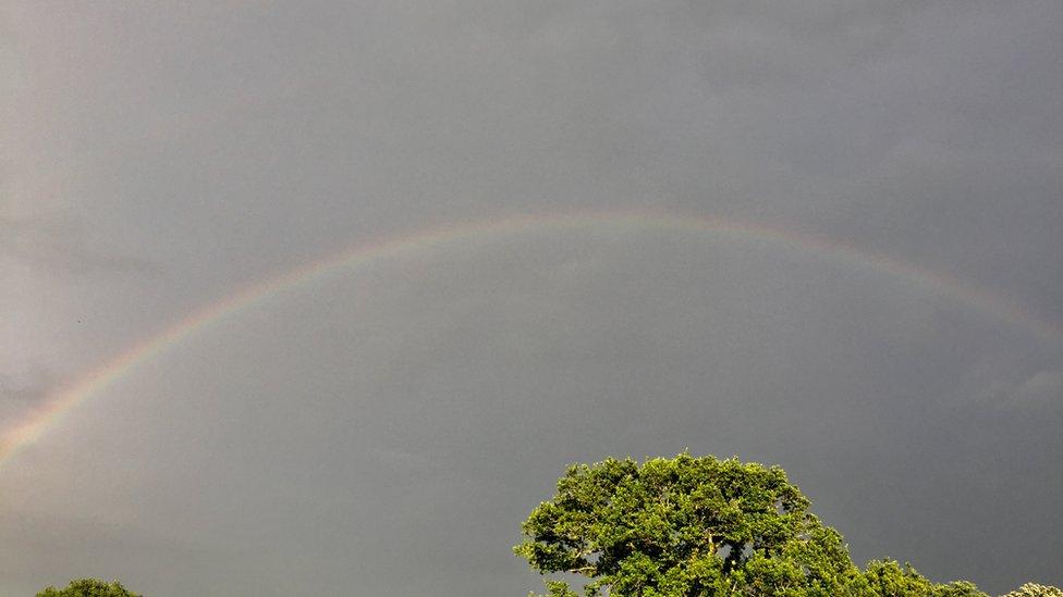 Searching for a pot of gold: Sixteen year old Megan Kay captured this rainbow amid stormy skies in Rhoslan, near Criccieth