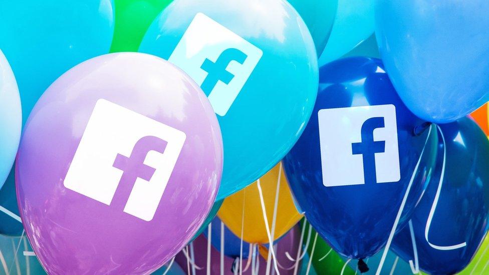 Facebook logo on balloons