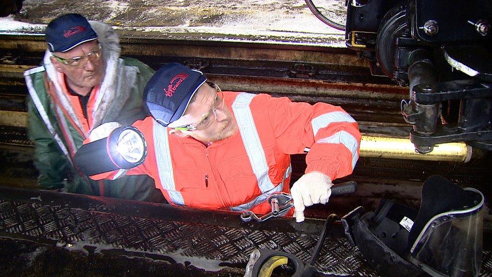 ex-offender inspects Virgin train