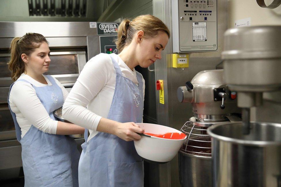 Baker Sophie Cabot poses for a photograph in the kitchens of Buckingham Palace in London on October 10, 2018