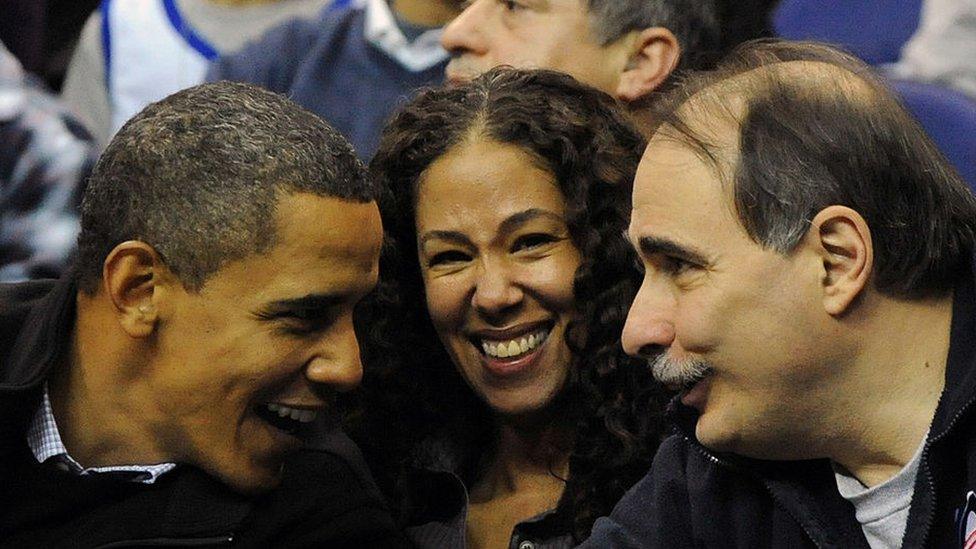 Former US president, Barack Obama (L) with his senior advisor David Axelrod (R) at a basketball game