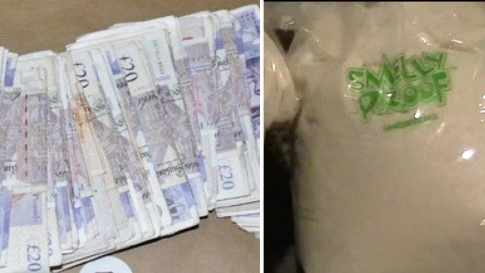 A pile of money and a bag of drugs