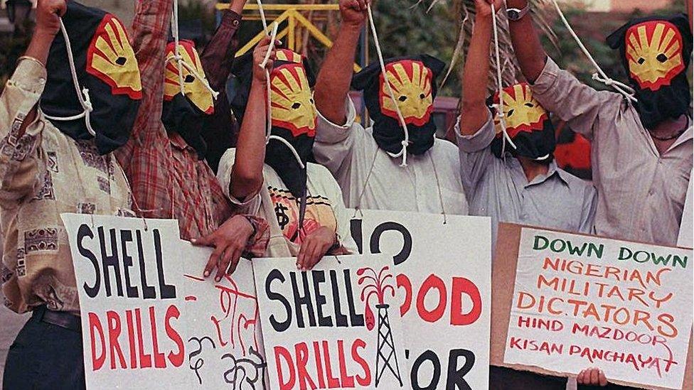 Human rights activists with black masks and hangman's nooses around their neck demonstrated 10 November,outside Shell India's headquaters in South Bombay