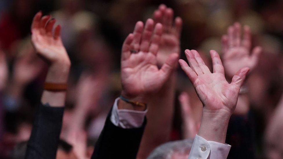 Delegates vote during day one of the annual Labour party conference