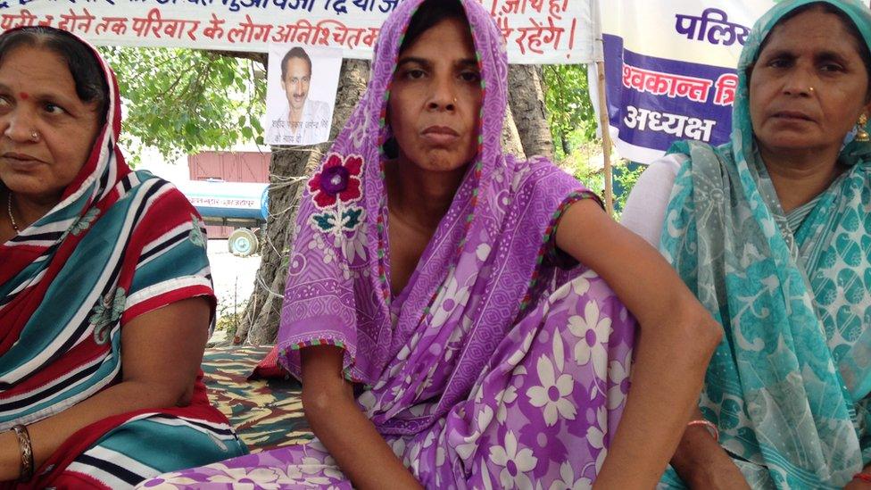 Jagender Singh's wife sitting on a protest in Shahjahanpur