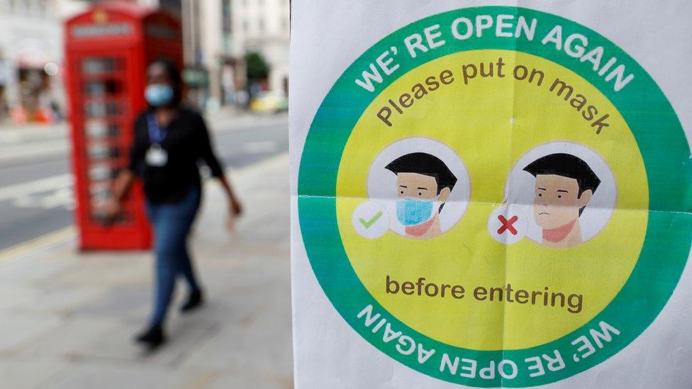 Sign in London urging people to wear face masks