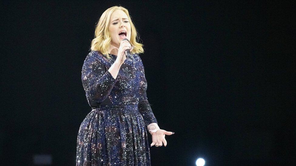 Adele performs on her world tour