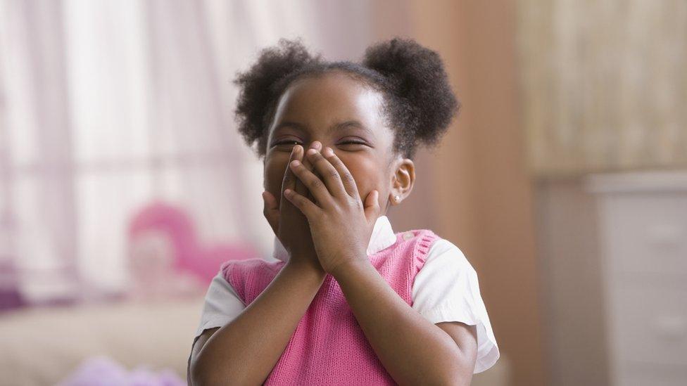 Little girl laughing