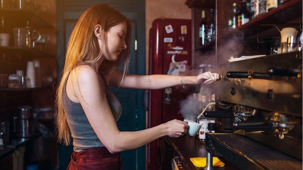 Woman working in a coffee shop