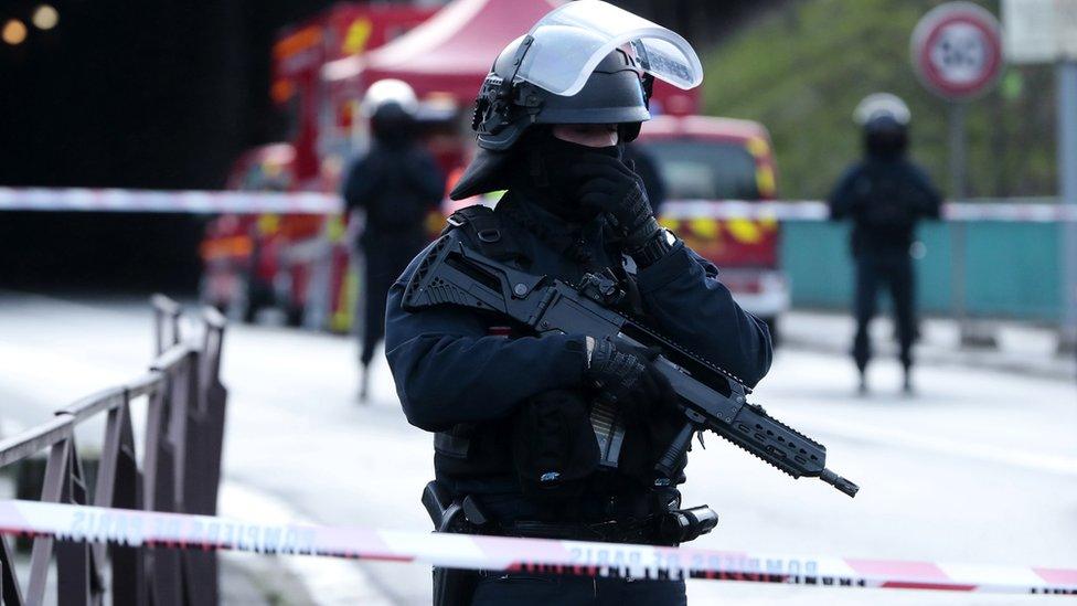 French police guard security perimeter at the Hautes-Bruyères public park in Villejuif, near Paris, 3 January 2020