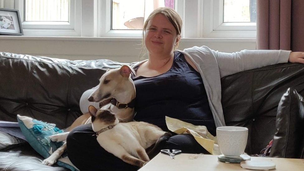 Jasmine the cat with Laura Teale and dog Willow